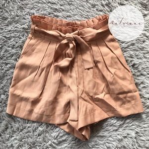 ASTR the Label Pacific Pleated Tie Waist Shorts in Peach Papaya XS